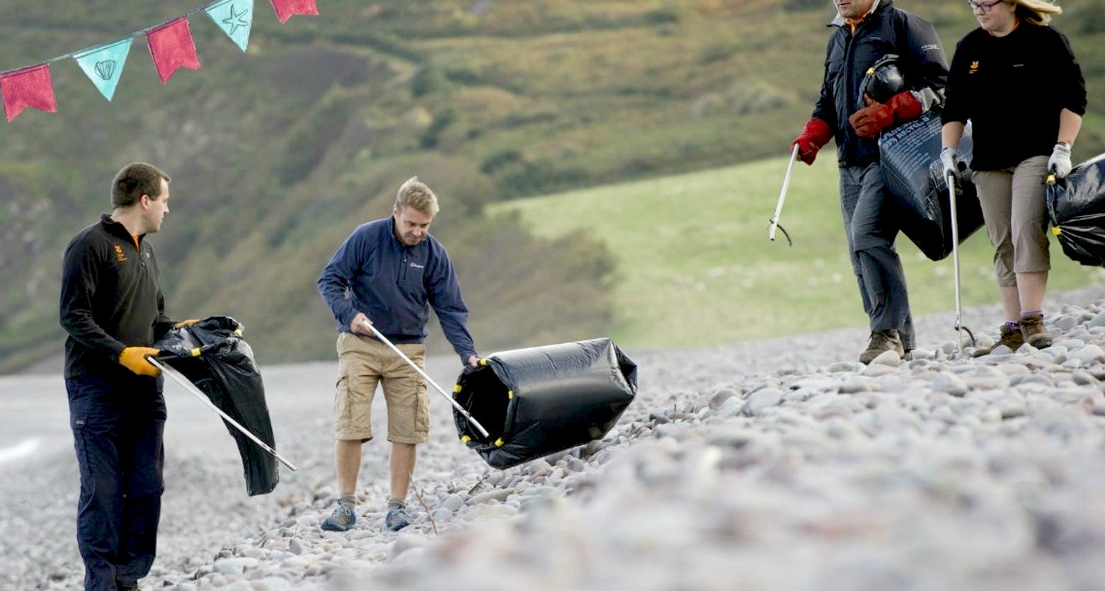 Beach cleaning using black plastic bags for collection